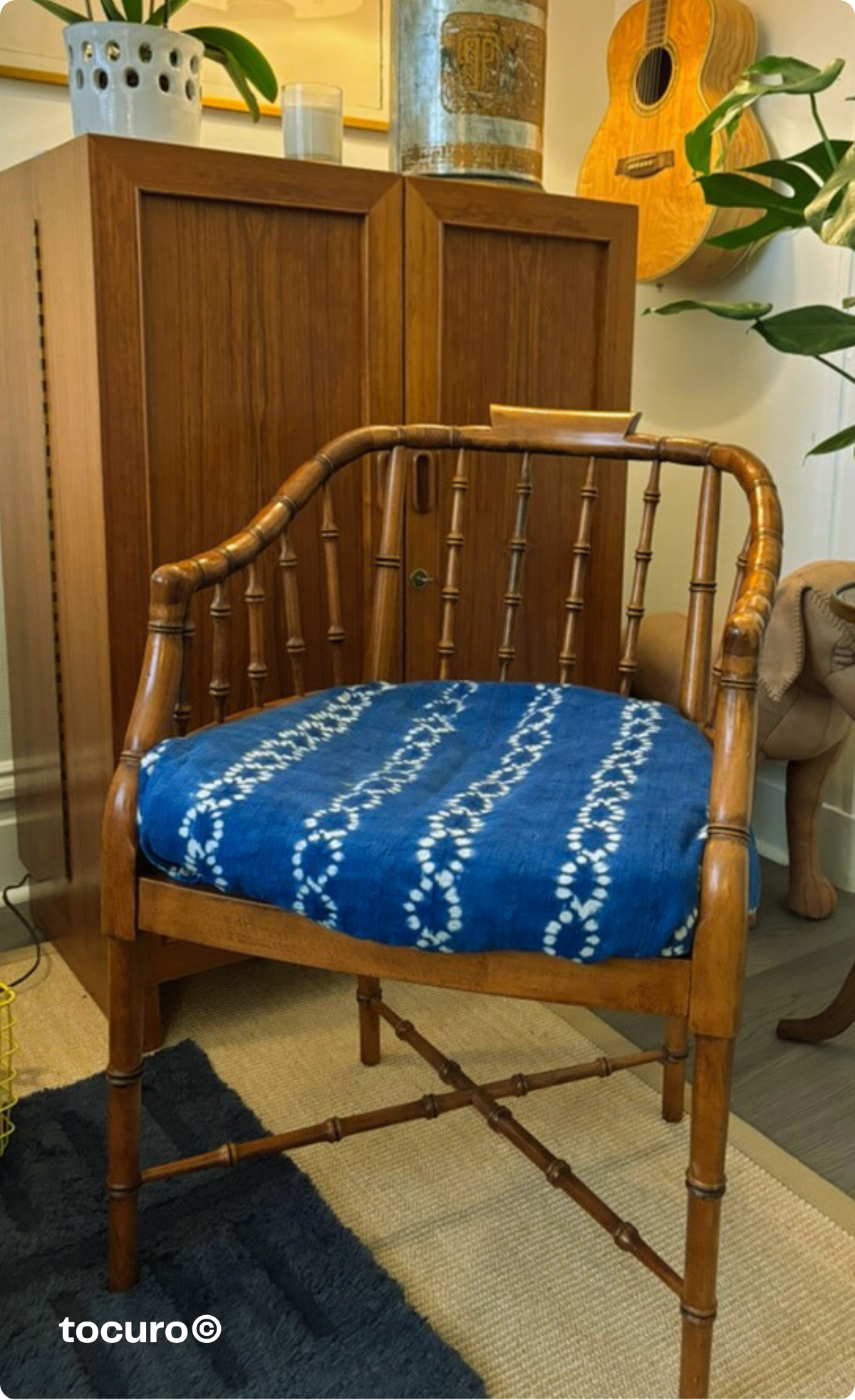 The same Baker armchair styled in my living room—where it proved to be the perfect transitional piece that worked in multiple spaces