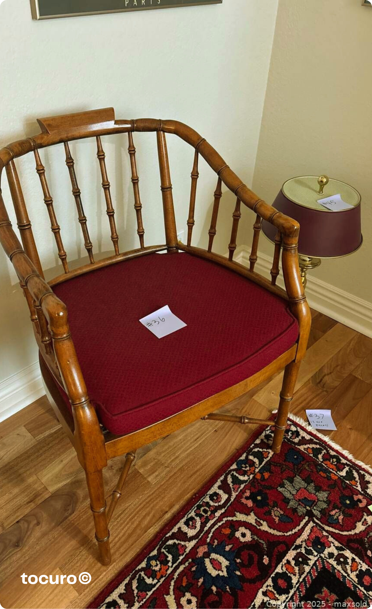 The original auction listing showing the Baker Furniture faux bamboo armchair listed at $85—before I knew what I'd actually found